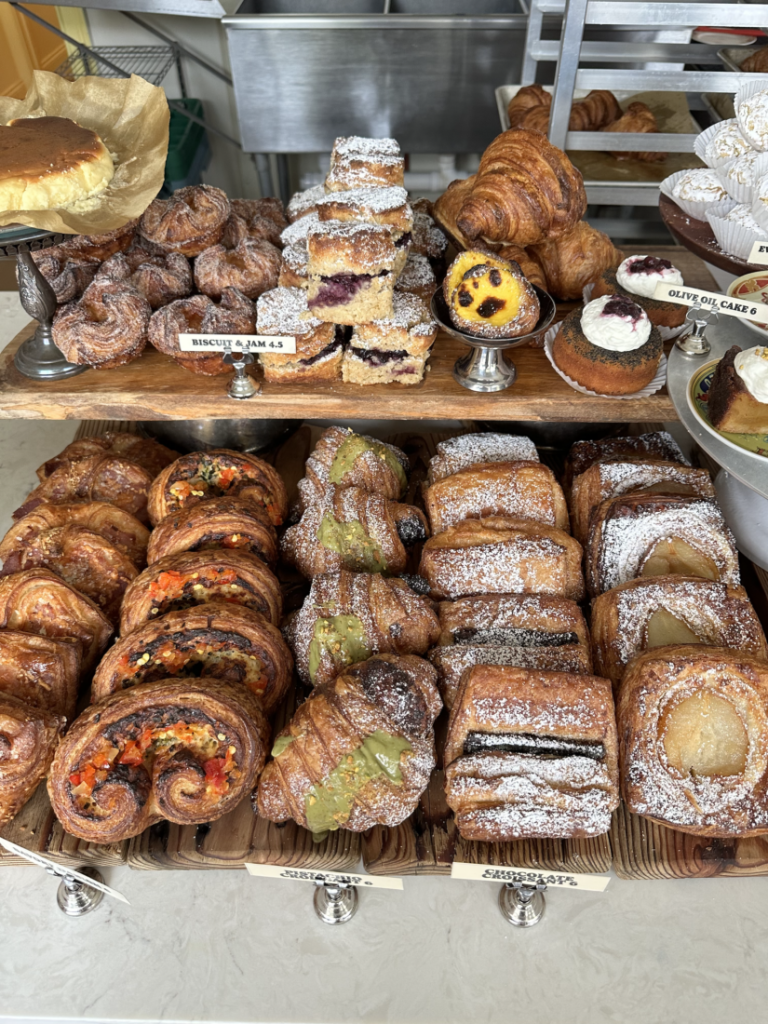 aesthetic cafe story template pastry display at cafe with croissants and pain au chocolat