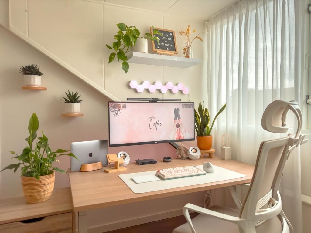 aesthetic lifestyle blogger story aesthetic desk setup with laptop, succulents, and a warm lamp